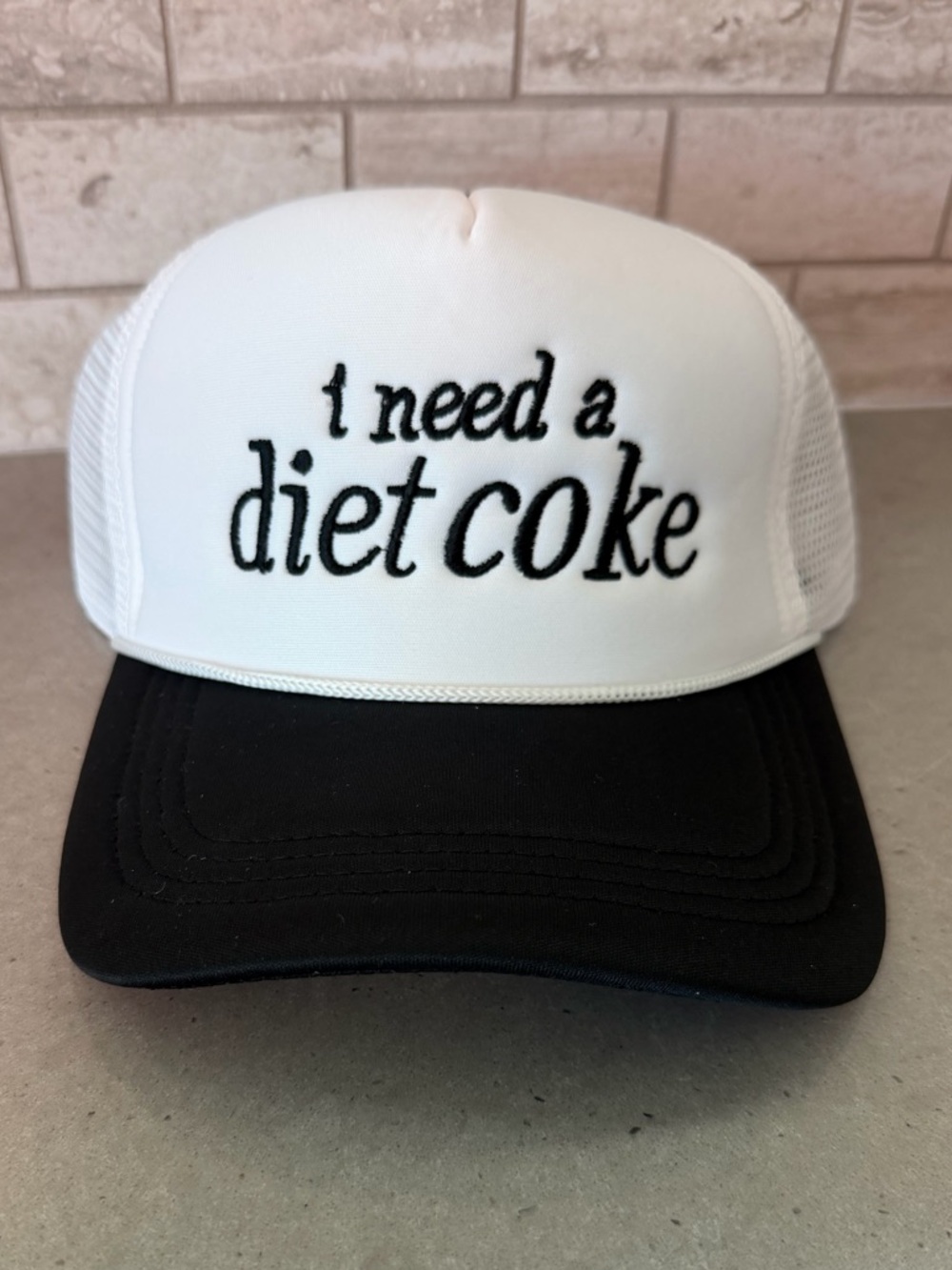 White & Black 'I Need a Diet Coke' Trucker Hat
